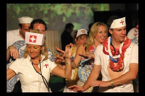 Nurses, sailors and hula girls get into the swing at the South Pacific/Pearl Harbour fancy dress party